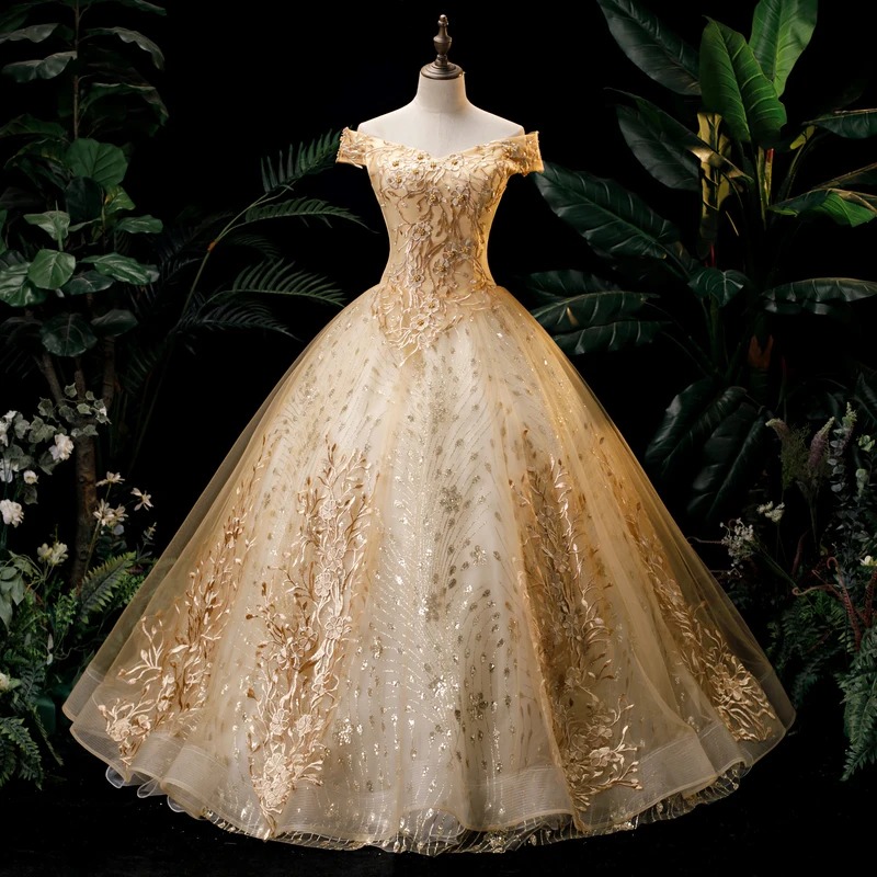 ชุดเดรสงานเลี้ยงสีทอง 15 ปี ชุดงาน Quinceanera แบบเปิดไหล่ ทรงบอลกาวน์ ลูกไม้สไตล์วินเทจ ชุดงาน Quinceanera ไซส์ใหญ่ สามารถสั่งตัดได้
