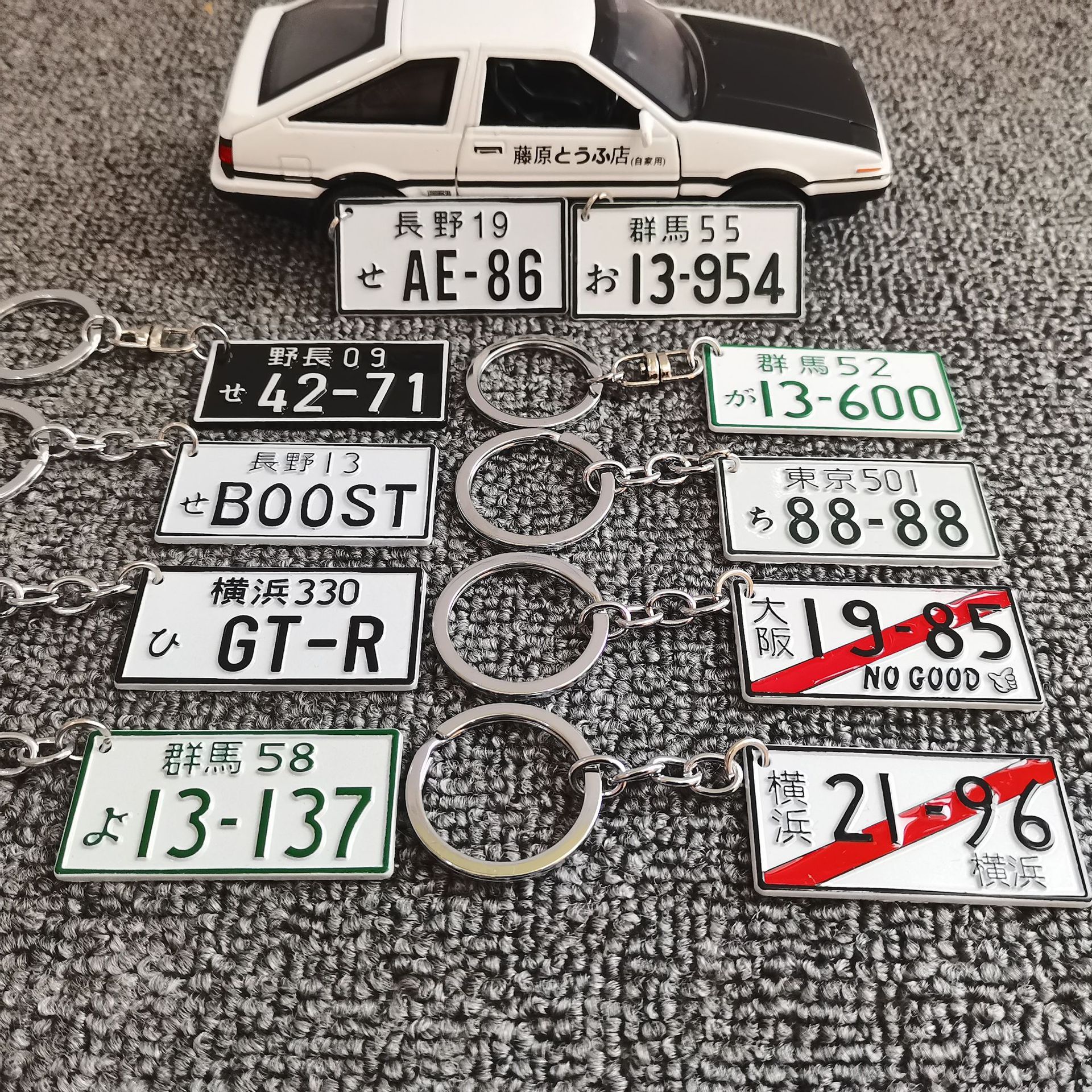 Heißer Verkauf Auto Zahlen Japanische Nummernschild Nummer Schlüsselanhänger JDM Racing Auto Motorrad Tag Schlüsselanhänger Personalisiertes Nummernschild