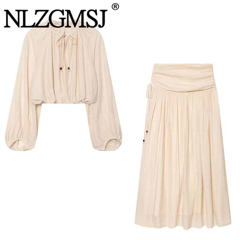 Conjunto Feminino Casual de Verão NLZGMSJ 2026: Blusa Curta com Efeito Amassado Gola O e Saia Longa Reta com Zíper – Moda para Férias