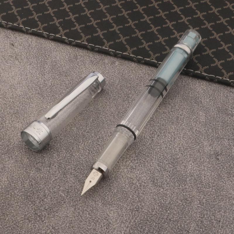 Stylo plume à piston en plastique transparent, fournitures scolaires et de bureau d'affaires, stylos à encre d'écriture, 1PC