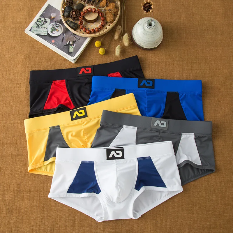 Herren-Unterwäsche aus Milchseide mit flachem Winkel, bequeme und hautfreundliche, atmungsaktive, seidig glatte, schnell trocknende Low-Rise-Boxershorts