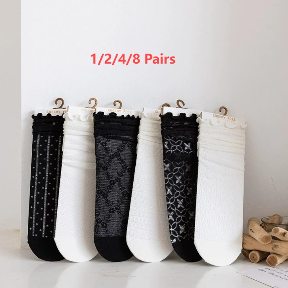 1/2/4/8 Paar modische Damensocken für Frühling und Sommer, lange schwarze und weiße Spitze, Harajuku-Rüschen, lässige süße Blumensocken