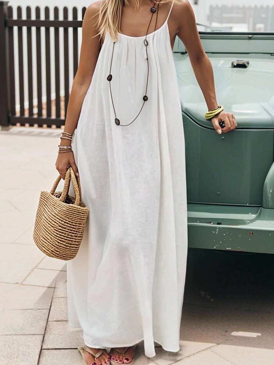2026 Nieuwe Europese en Amerikaanse grensoverschrijdende dameskleding, effen kleur losse, casual, veelzijdige slip-backless maxi-jurk
