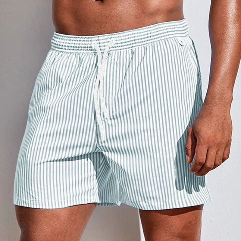 Pantaloncini corti da uomo con motivo a righe verticali semplici, pantaloncini da spiaggia stampati in 3D per l'uso quotidiano estivo, pantaloncini da bagno larghi per le vacanze