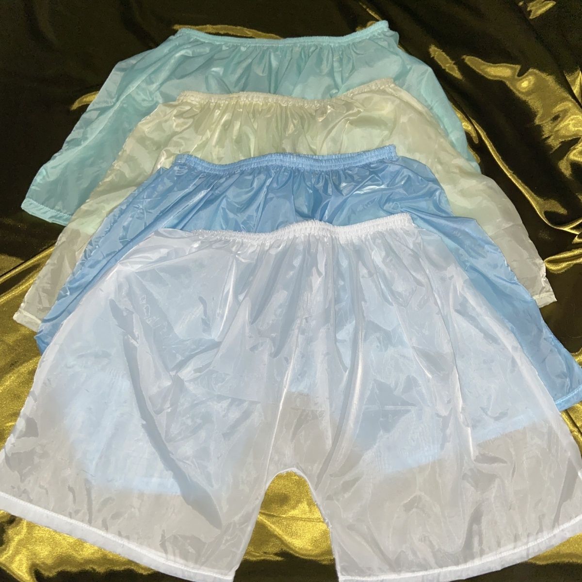 Plástico fino sin costuras ver a través de mujeres hombres ropa interior pantalones cortos calzoncillos elásticos calzoncillos Boxer para hombres