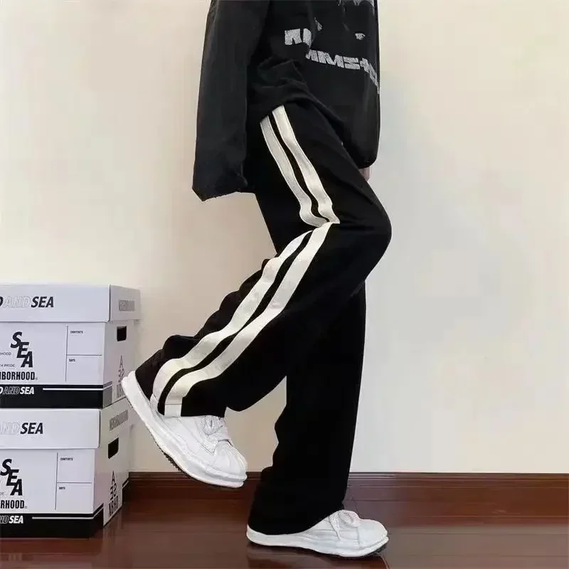 2025 moda coreana calças de perna larga feminina solta casual listrado cintura alta mulher hiphop cintura elástica bolso calças retas
