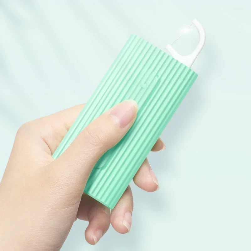 1 Juego de caja de almacenamiento de hilo dental portátil automático de plástico, dispensador de selección de hilo dental, práctico, ideal para viajar y acampar