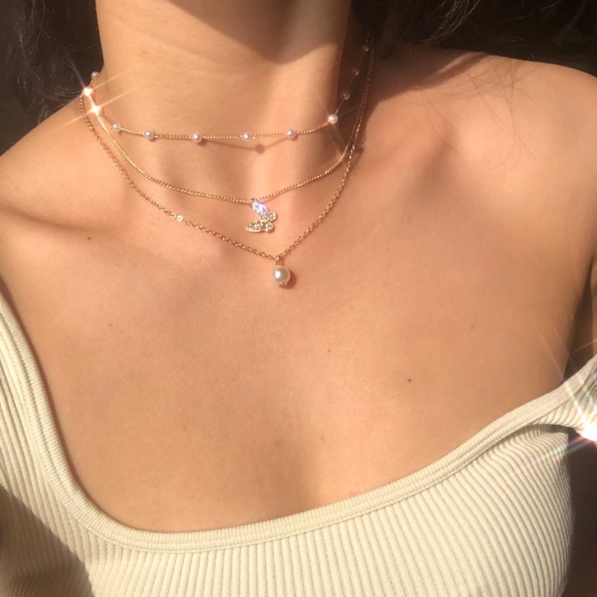 3 ชิ้นชุด Golden Multilayer สร้อยคอตกแต่งด้วยเลียนแบบ Pearl Clavicle Chain Creative Simple สร้อยคอจี้ผีเสื้อใหม่