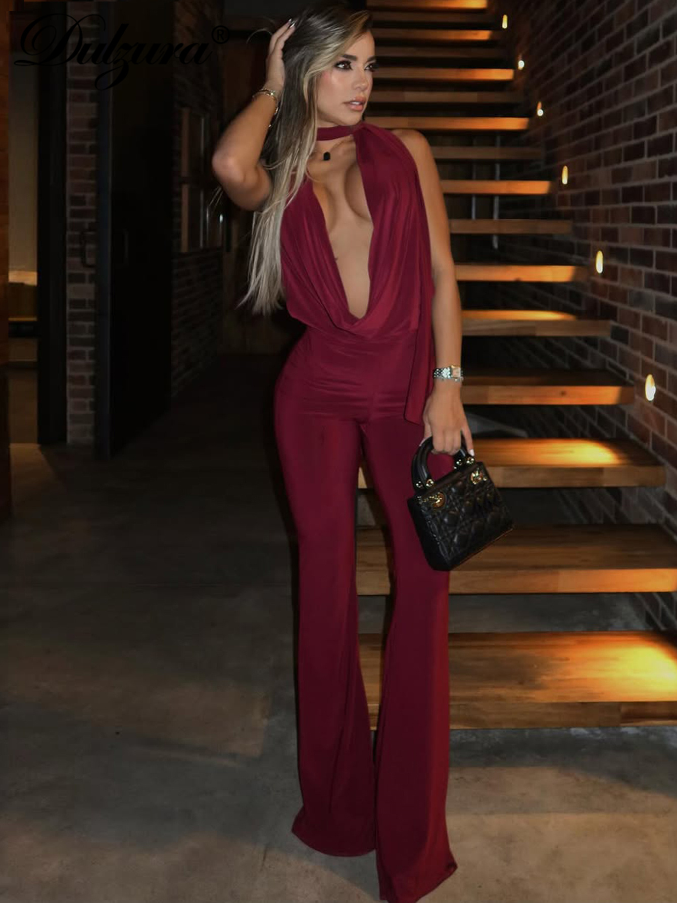 Dulzura 夏ソリッドセクシーなホルタースイングカラーバックレススリムレースアップフレアジャンプスーツ女性のファッションエレガントなパーティークラブロンパース