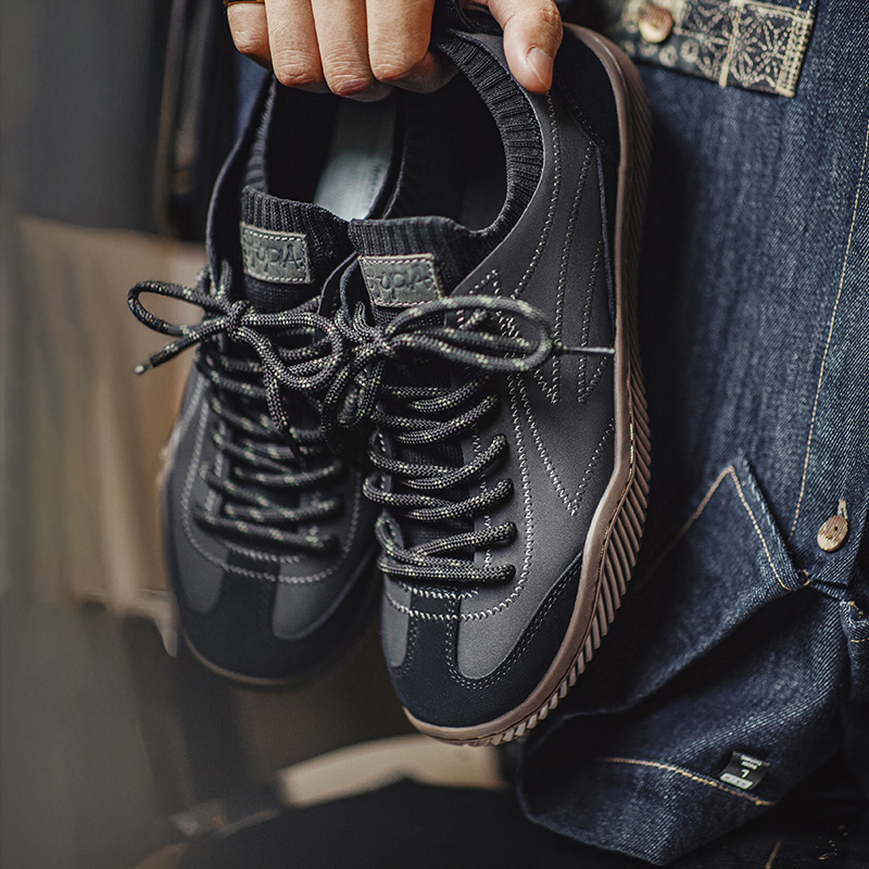 Maden Sepatu Pelatih Jerman Tambal Sulam Hitam Retro Sepatu Kaus Kaki Rajut Satu Potong Sepatu Papan Sporty Musim Panas Pria Kasual Bertali