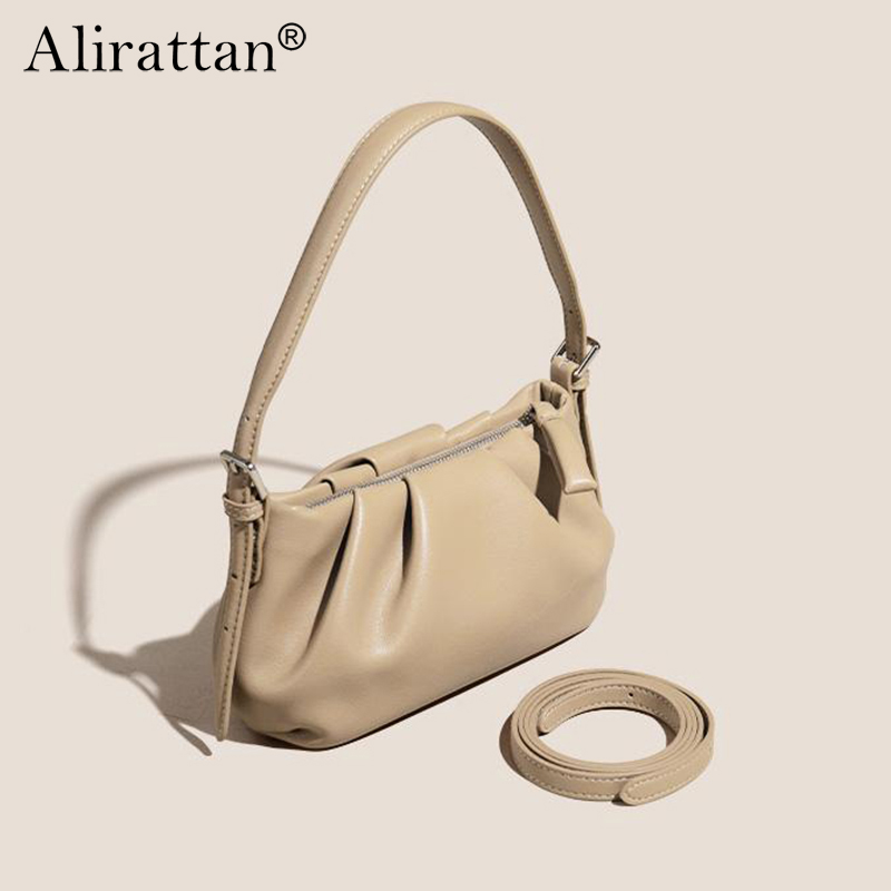 Alirattan 2026 Nieuwe effen kleurige koeienhuid cloud tas, handtas, schoudertas, diagonale crossbody tas, gevouwen dumpling tas