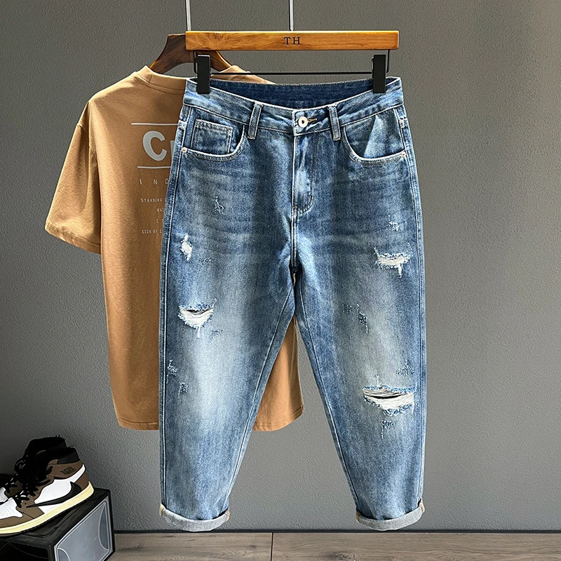 Nieuwe heren gescheurde jeans persoonlijkheid mode taps toelopend gat gerafeld denim broek streetwear casual vintage blauwe broek mannelijke kleding