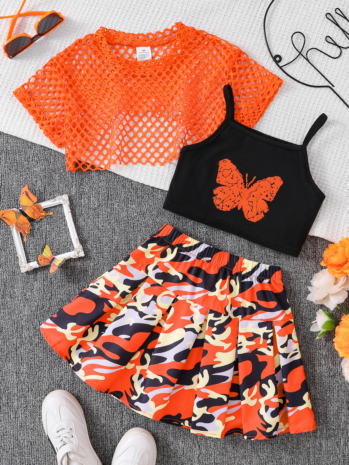 Conjunto de tres piezas de moda de verano para niña, camiseta de manga corta de malla fresca y transpirable, Falda corta con tirantes finos y estampado de mariposa