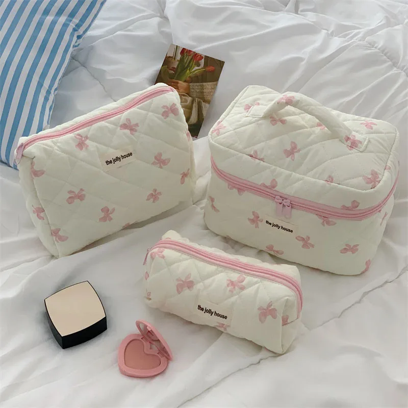 Sac à cosmétiques matelassé pour femmes, 1 pièce, pochette de maquillage avec nœud mignon, sac de rangement de toilette Portable de voyage, sac à main organisateur
