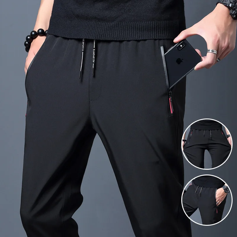 Pantaloni casual da uomo Dritto Slim Fit Elastico in vita Jogger Coreano Classico Blu Nero Grigio Pantaloni di marca maschile Taglie forti