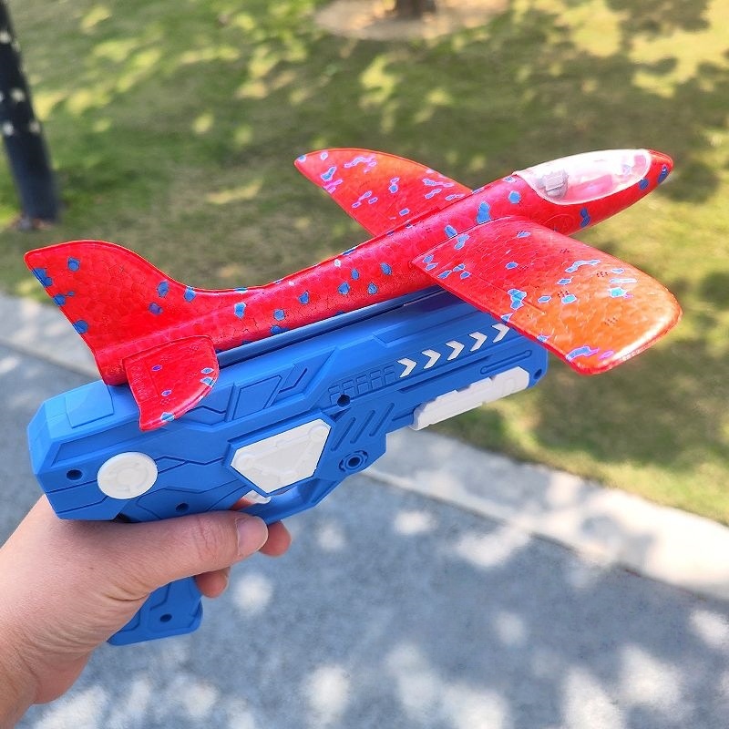 Katapult Schaum Flugzeug Pistole Feuer Outdoor Sport Hand Werfen Fliegende Segelflugzeug Spielzeug Jungen Mädchen