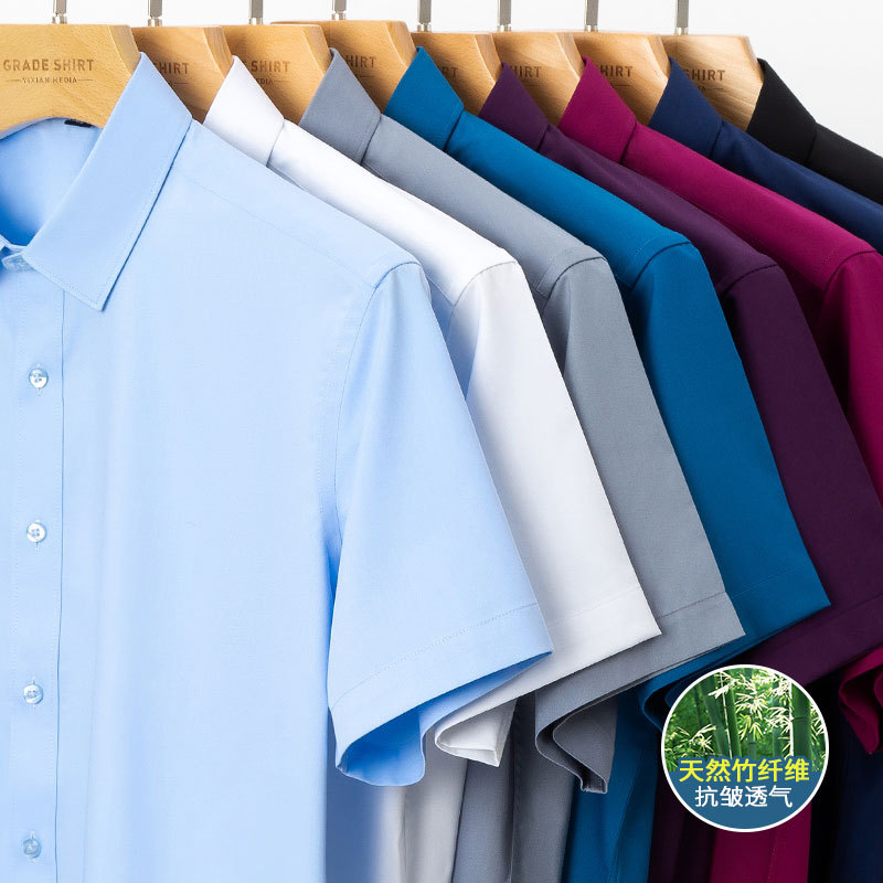 Camisa elástica de fibra de bambú para hombre, Top de manga corta, informal, de negocios, antiarrugas, Color sólido, S-6XL