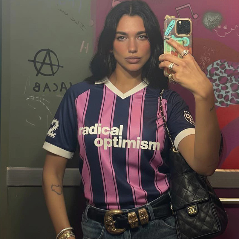 Kaos Jersey Unisex Optimisme Radikal, Kaos Polo Bergaris Jala, Atasan Kaos Longgar Ukuran Besar, Kaos Bersablon Huruf, Pakaian Musim Panas Pria Wanita