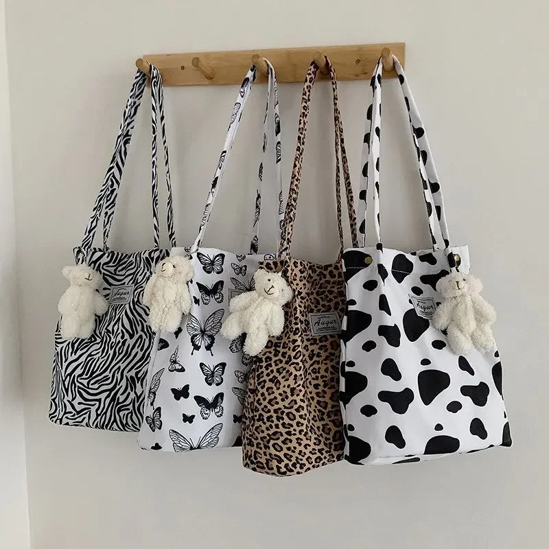 Borsa tote casual grande chic coreana Borsa a tracolla leopardata Borsa in tela da donna Nuova borsa per lo shopping con stampa per studenti Bolsa Mujer