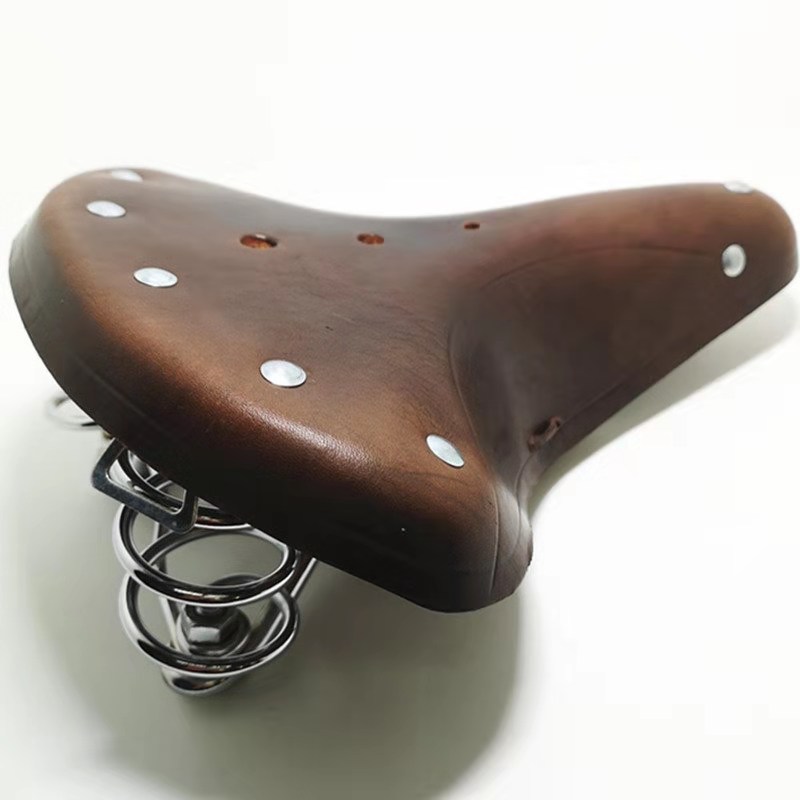 Selle de vélo de route en cuir de vache, Design rétro traditionnel à rivets, siège classique Vintage, coussin de vtt, coussin de cyclisme avec corde