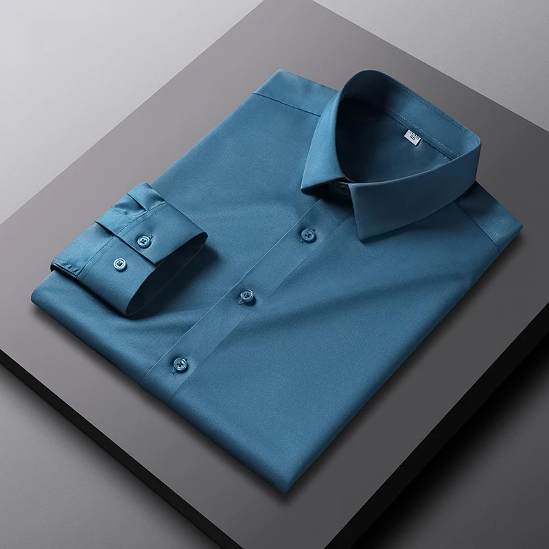 เสื้อเชิ้ตสีทึบแขนยาวลําลองและทันสมัยของผู้ชายไม่รีดผ้าและทนต่อริ้วรอยเสื้อธุรกิจ