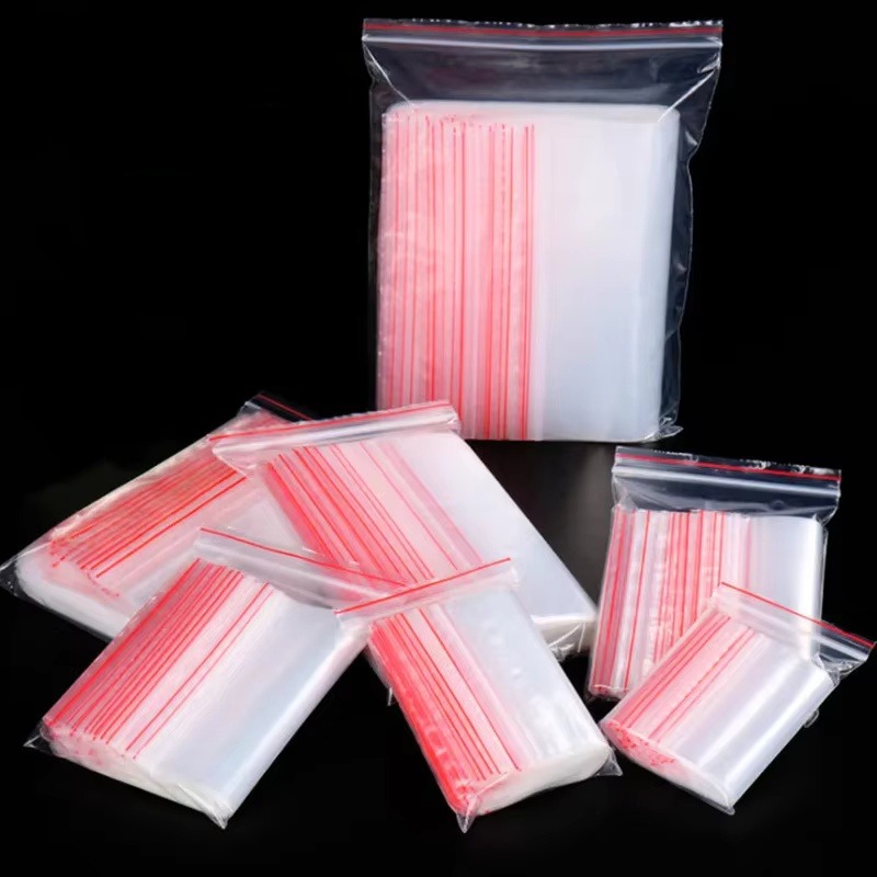 50 mikronów 100 sztuk/opakowanie Wysokiej Jakości Przezroczyste PE Torebki z Zamknięciem Strunowym Wielokrotnego Użytku Plastikowe Słodycze Cukierki Suszone Owoce Proszek Książki Prezenty Ciasteczka Woreczki