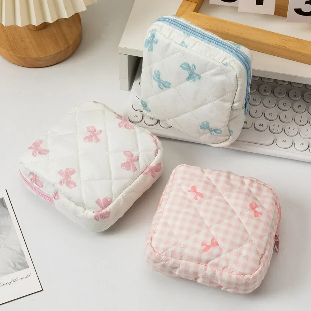 Mini bolsa de cosméticos con lazo bonito para mujer, bolsa de almacenamiento de toallas sanitarias, soporte portátil para tampones, Mini bolsa de almacenamiento para lápiz labial y maquillaje