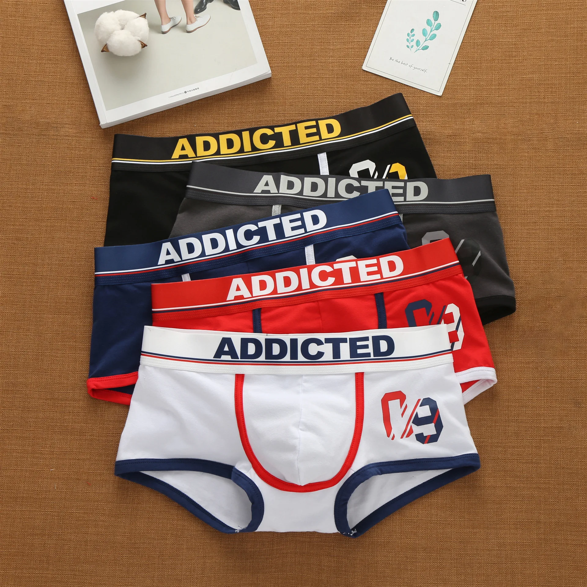 Celana dalam katun alfabet Korea pria model low-rise gaya elastis tren mode boxer