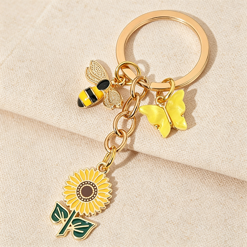 Porte-clés mignon en émail, motif tournesol, abeille, papillon, en alliage métallique, breloque de sac, pendentif pour femme, accessoires pour voiture, sac à dos, portefeuille