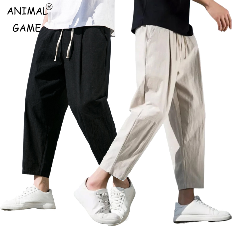 Celana olahraga Linen pria, celana olahraga ringan katun warna Solid bernapas jogging pria, celana longgar Streetwear celana panjang pria