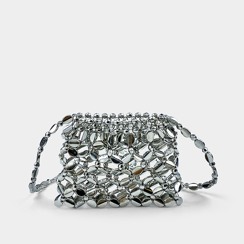 2024 nuova borsa a tracolla per cuffie intrecciata a mano con mini borsa cava in metallo argento dal design di nicchia