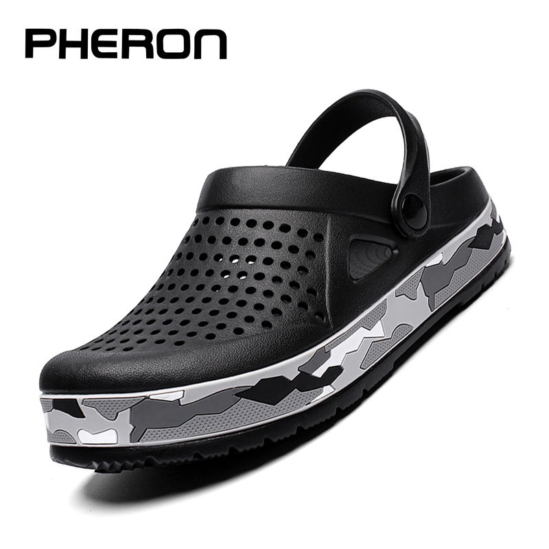 Sandal bakiak pria, 2023 ukuran besar Slip On luar ruangan pantai sepatu musim panas sepatu medis kasual bernapas sandal pria dengan lubang