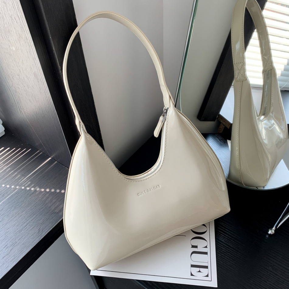Borse a tracolla alla moda per le donne Designer Colori solidi Borsa a mezzaluna in pelle verniciata 2024 Nuova piccola borsa da donna Totes Sac