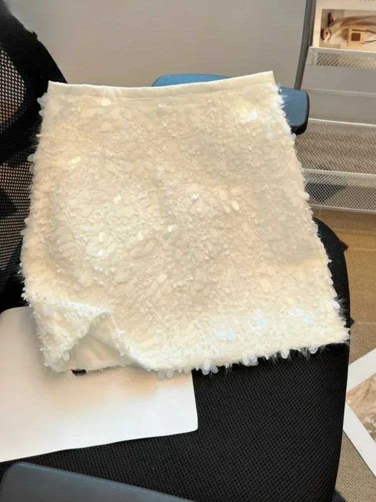 Minifalda acampanada de moda coreana para mujer, falda Sexy de Color sólido con lentejuelas, faldas ajustadas de cintura alta envueltas en la cadera, novedad de verano para primavera