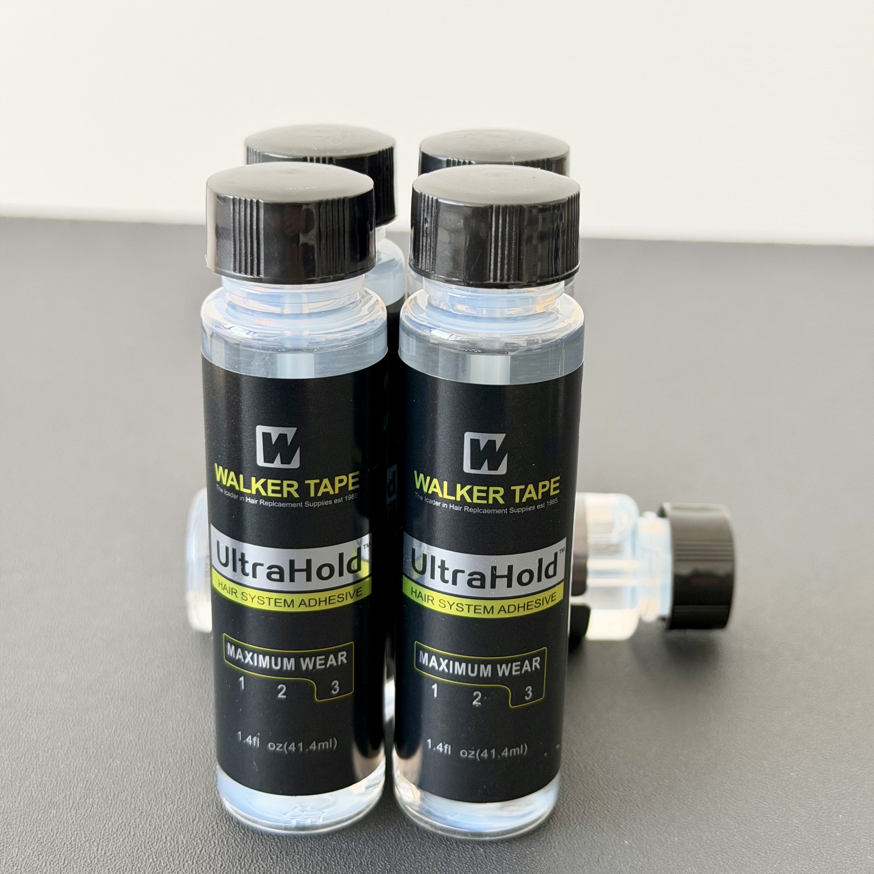 Adhesivo para Sistemas Capilares Walker Tape UltraHold 1.4oz/41.4ml, 0.5oz/15ml, 3.4oz/101ml, Pegamento Fuerte para Pelucas y Postizos