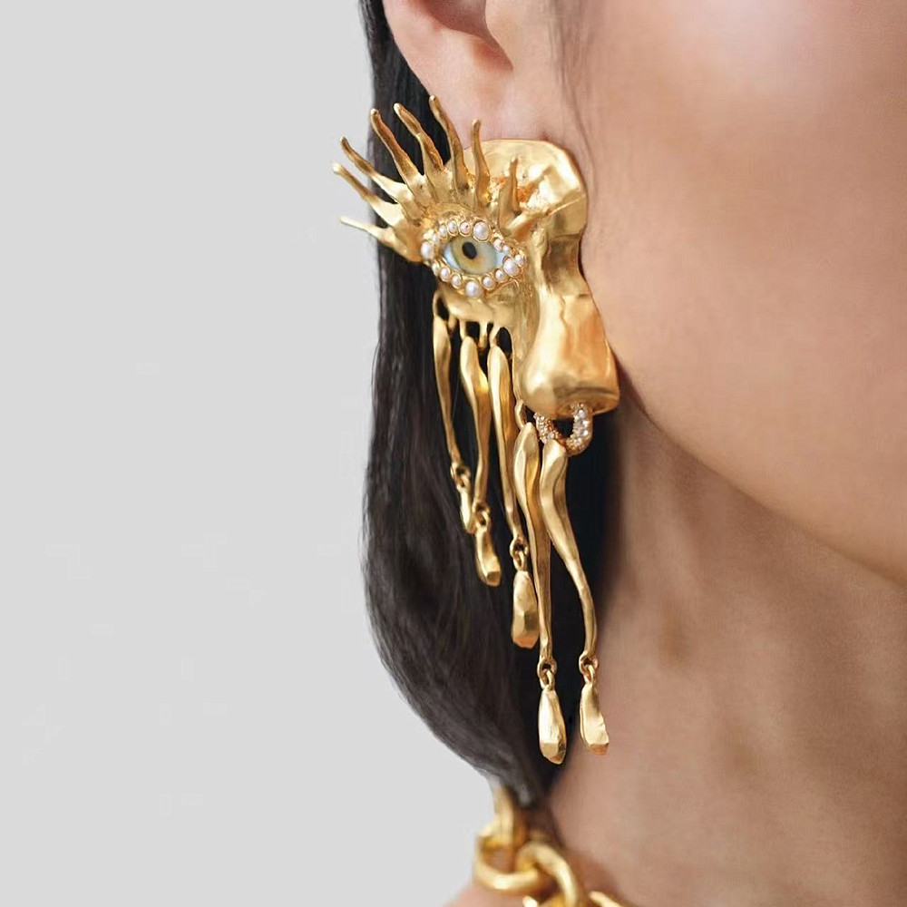 Pendientes colgantes de ojos chapados en oro de Metal de alta calidad para mujer, joyería, recién llegado, accesorios exagerados para orejas de mujer