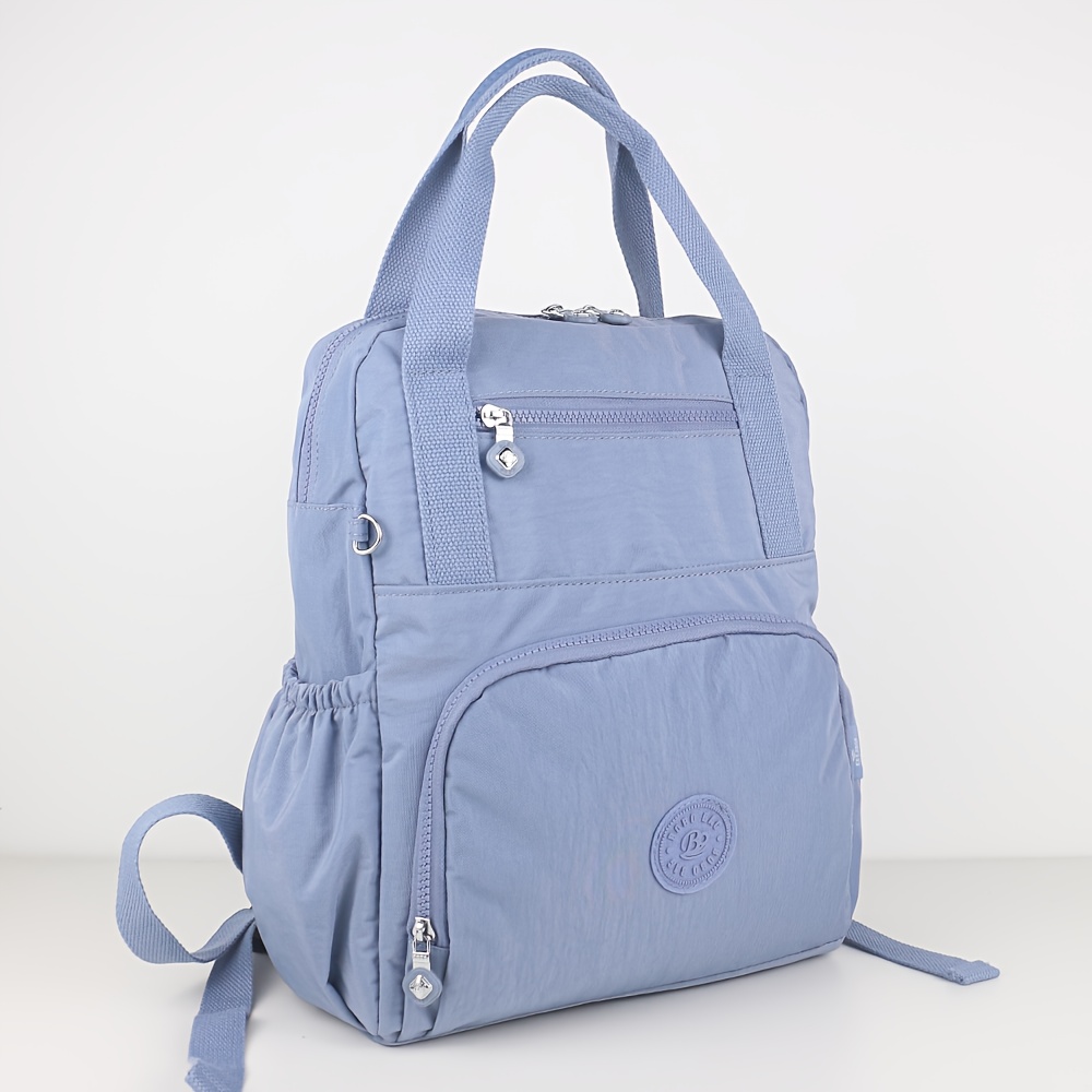 Tas ransel wanita, tas ransel perjalanan, tas sekolah, kapasitas besar dan banyak kantong, bahan nilon.
