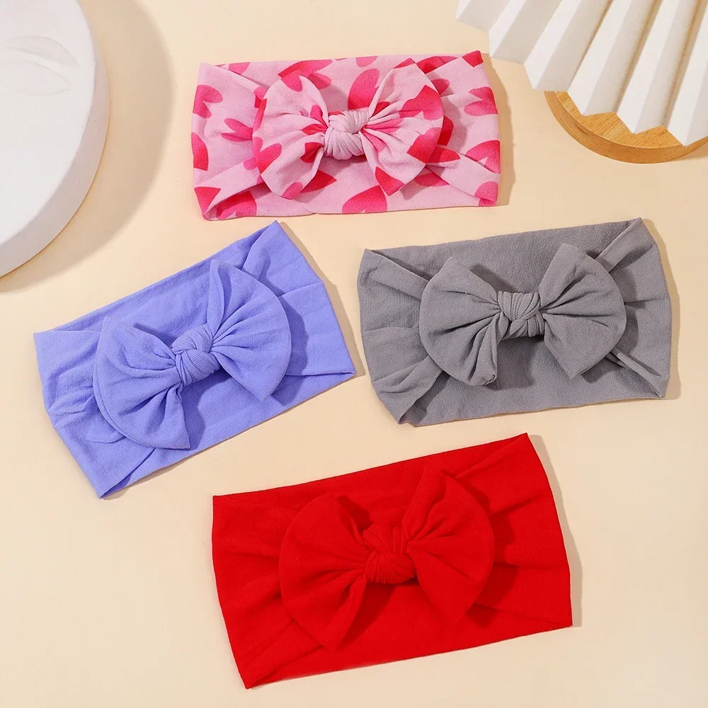 Diadema con lazo lateral de Color sólido Simple para niña, banda elástica para el cabello, turbante básico, accesorios para el cabello infantil, 1 ud.