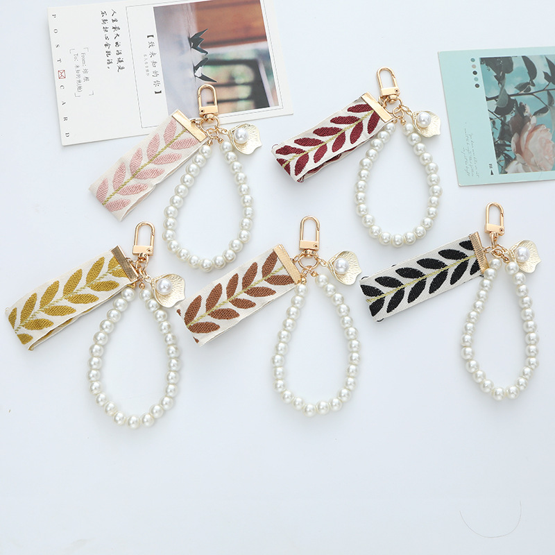 Fashion Fresh Ribbon Pearl Keychain for Women Creative Striped Cloth Tape Gold Color Key Buckle Bag Earphone Case Decoration