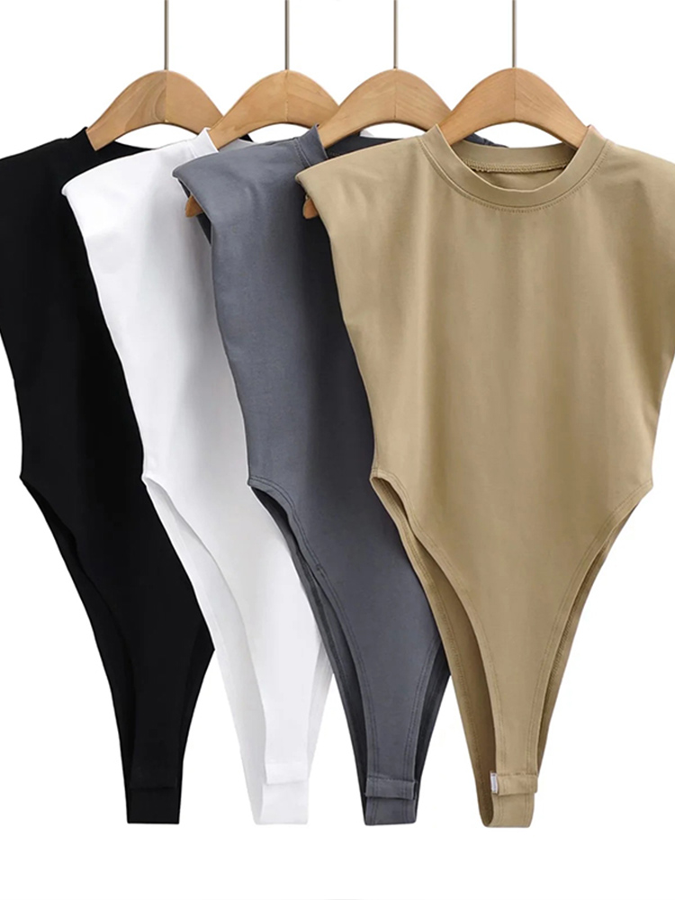 Top Sexy de una pieza para mujer, body ajustado con hombros acolchados, sin mangas, color negro y blanco, verano, 2024
