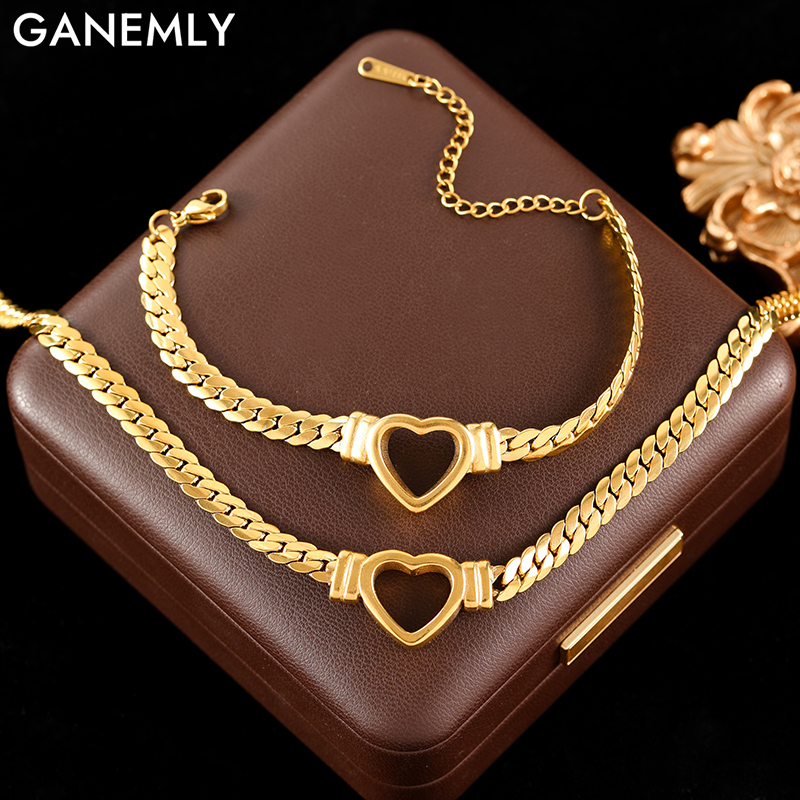 GANEMLY 316L สแตนเลส Hollow Heart สร้อยคอสร้อยข้อมือกันน้ําเครื่องประดับ Charm Metalic Gold สีแฟชั่น Lady ของขวัญ