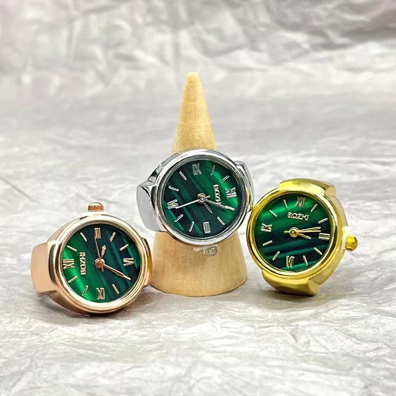 新しいホット販売クリエイティブ合金シェルフィンガーラウンドグリーンダイヤルカップル男性と女性のリング時計