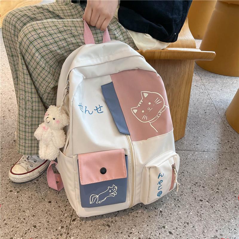 Hunderte von einfachen Schultaschen für Schüler der Mittelstufe. Schultasche für Grundschüler mit großem Fassungsvermögen und niedlichem Katzenmuster