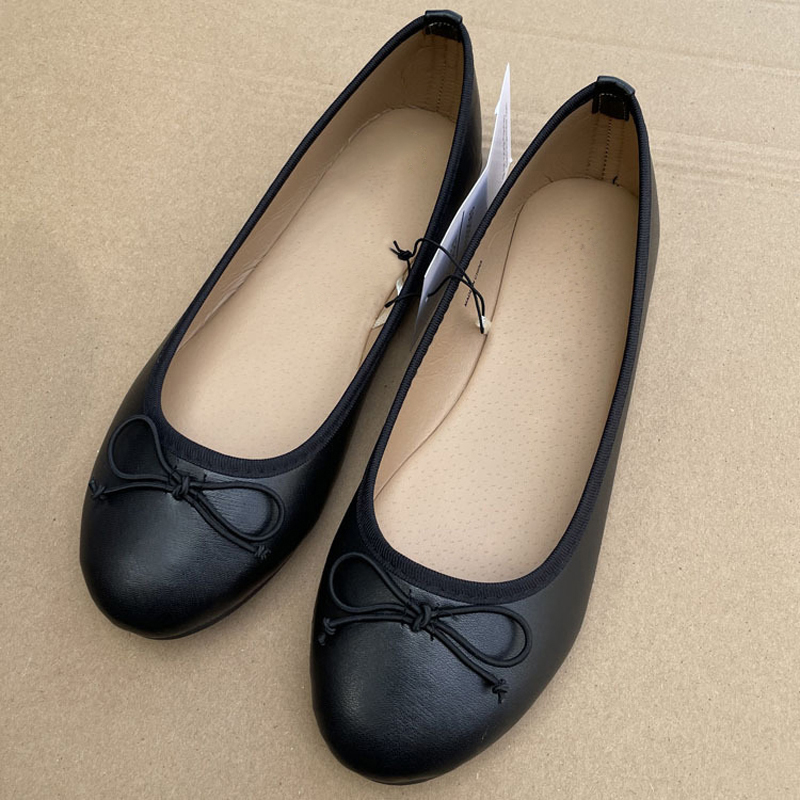 2026 primavera elegante bailarinas con lazo zapato clásico punta redonda comodidad Slip-On mocasines de moda para mujer zapatos de mulas de cuero