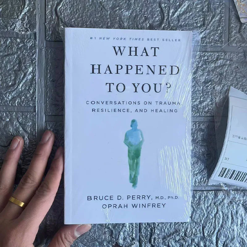 Wat gebeurt aan jou? Door Oprah Winfrey gesprekken over trauma, veerkracht en genezend paperbackboek in het Engels