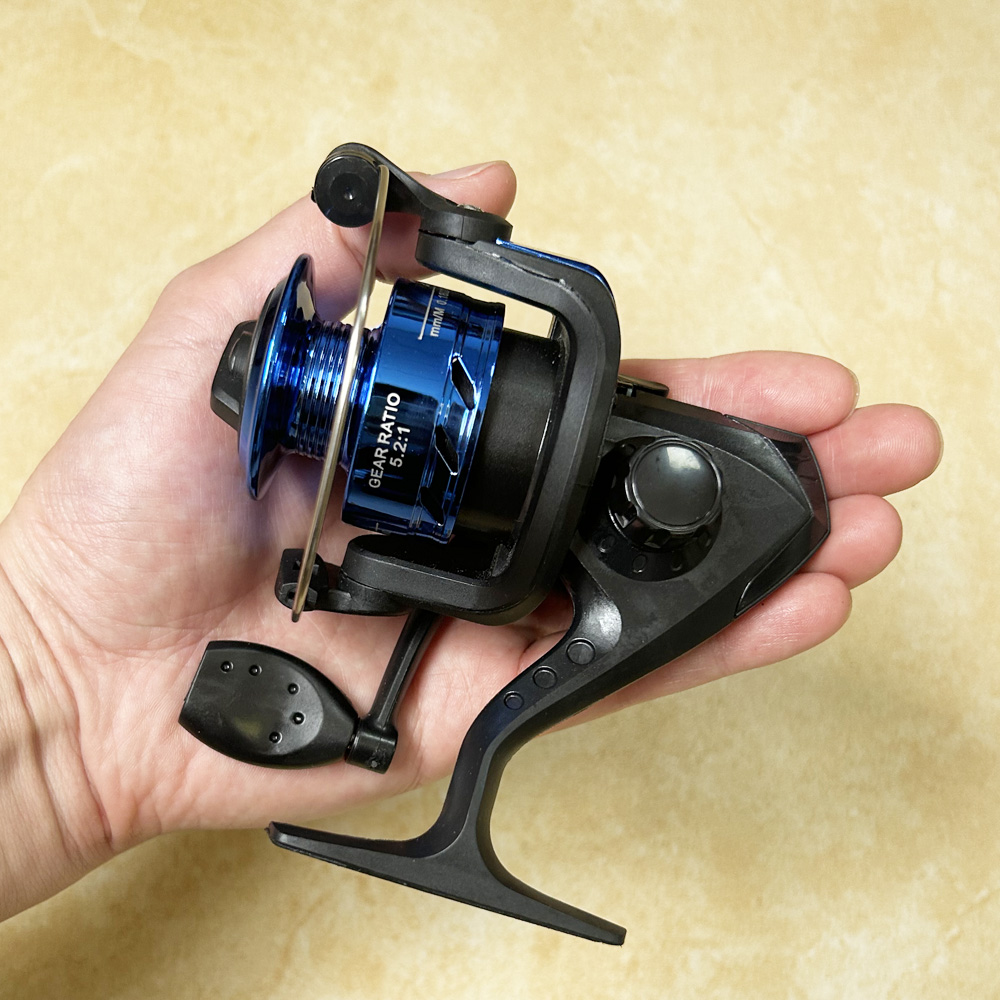 Carretes de pesca giratorios de plástico 5,2: 1 rueda carrete giratorio señuelo de pesca rueda barco cebo fundición pesca voladora Trolling