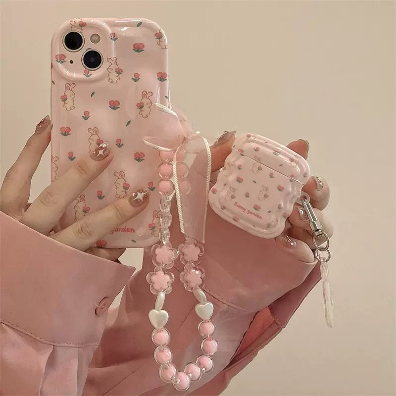 La custodia per telefono con catena di coniglio fiore simpatico cartone animato è adatta per iPhone 17, 16 Pro Max 15, 13 Pro 14, 12 11 Plus custodia morbida con braccialetto