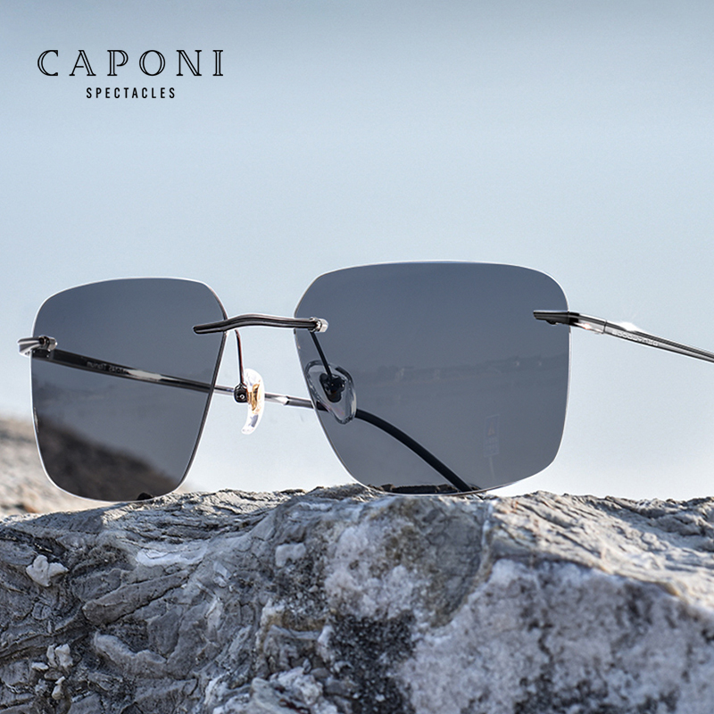 CAPONI แว่นกันแดดโพลาไรซ์ผู้ชายไทเทเนียมบริสุทธิ์ขับรถกลางแจ้งแว่นกันแดดโฟโตโครมิกน้ำหนักเบาเป็นพิเศษ UV400 ﻿ แว่นกันแดดสีดำ BS28923