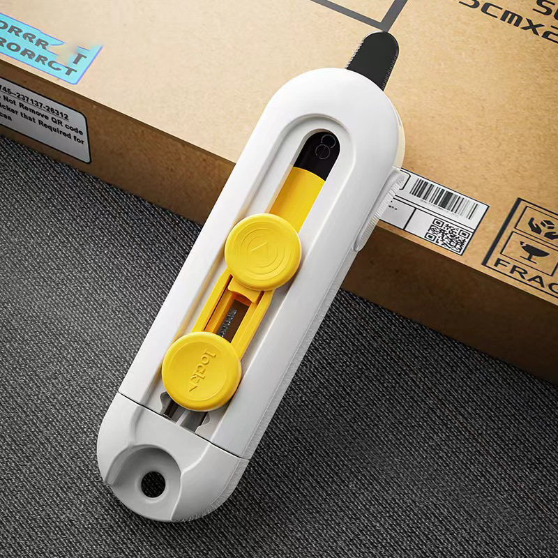 Traductor de paquetes de seguridad con cuchillas portátiles multifuncionales magnéticas para abrir cajas, con cortador deslizante retráctil y auto-bloqueante.