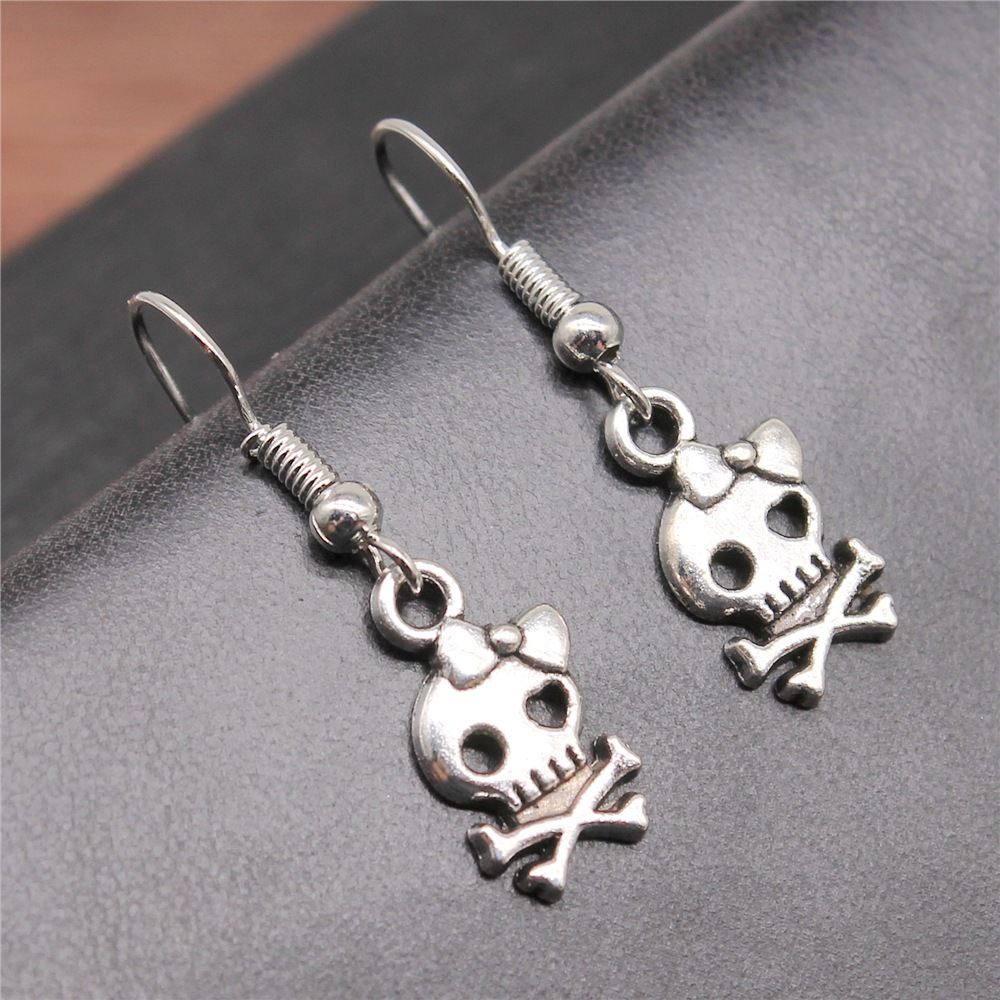 Mode fait à la main conception Simple Antique couleur argent arc crâne pendentif boucles d'oreilles femmes Vintage boucles d'oreilles
